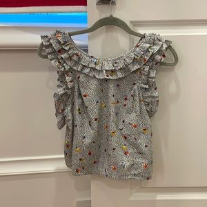 This is a KOCH blouse size small. Only been worn once!